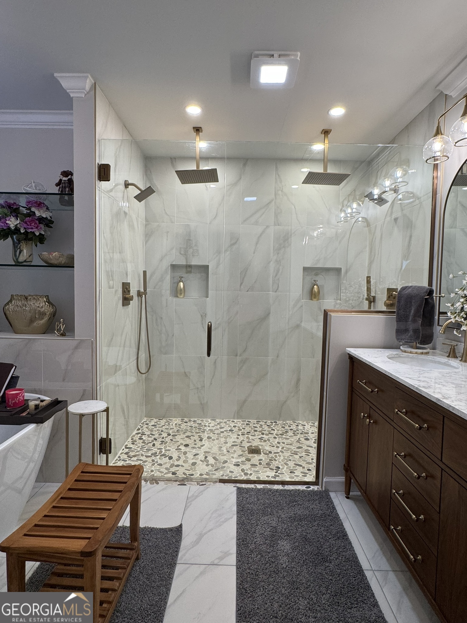 4633 Rustic Ridge Road Valdosta, GA 31602 - Photo 24 of 46 a bathroom with a double vanity sink toilet and shower