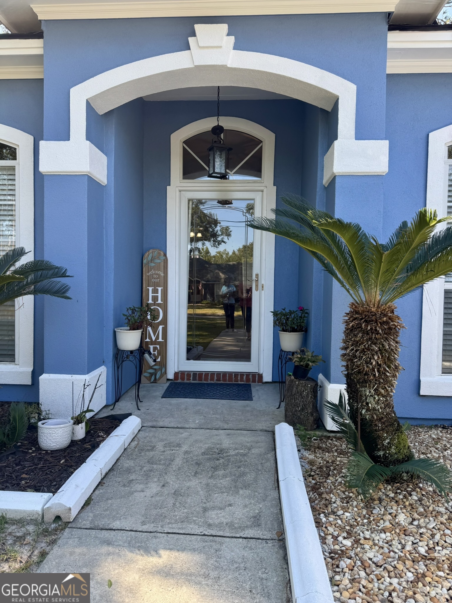 4633 Rustic Ridge Road Valdosta, GA 31602 - Photo 4 of 46 a living room with furniture and a rug