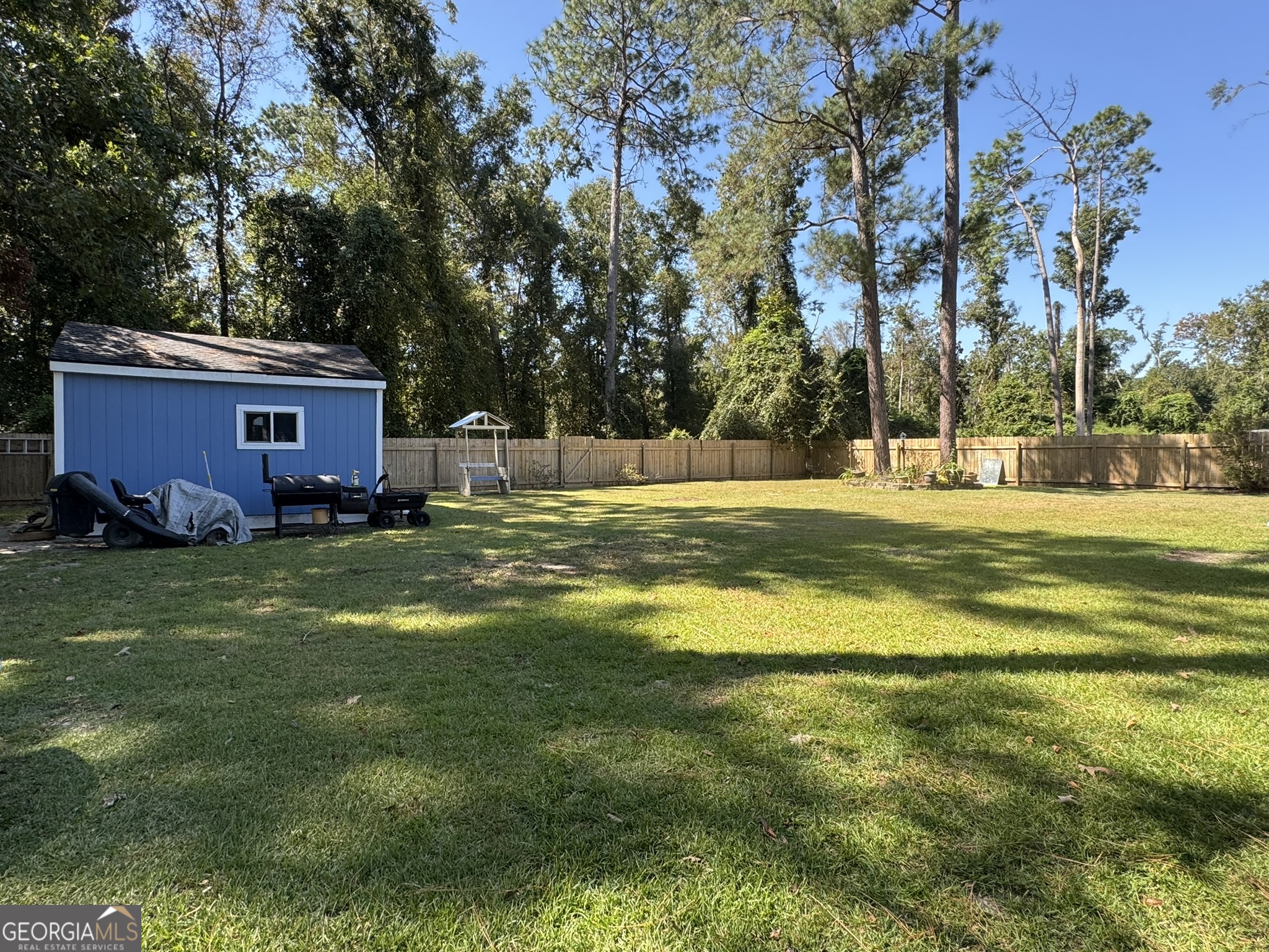 4633 Rustic Ridge Road Valdosta, GA 31602 - Photo 43 of 46 a swimming pool view with a outdoor seating
