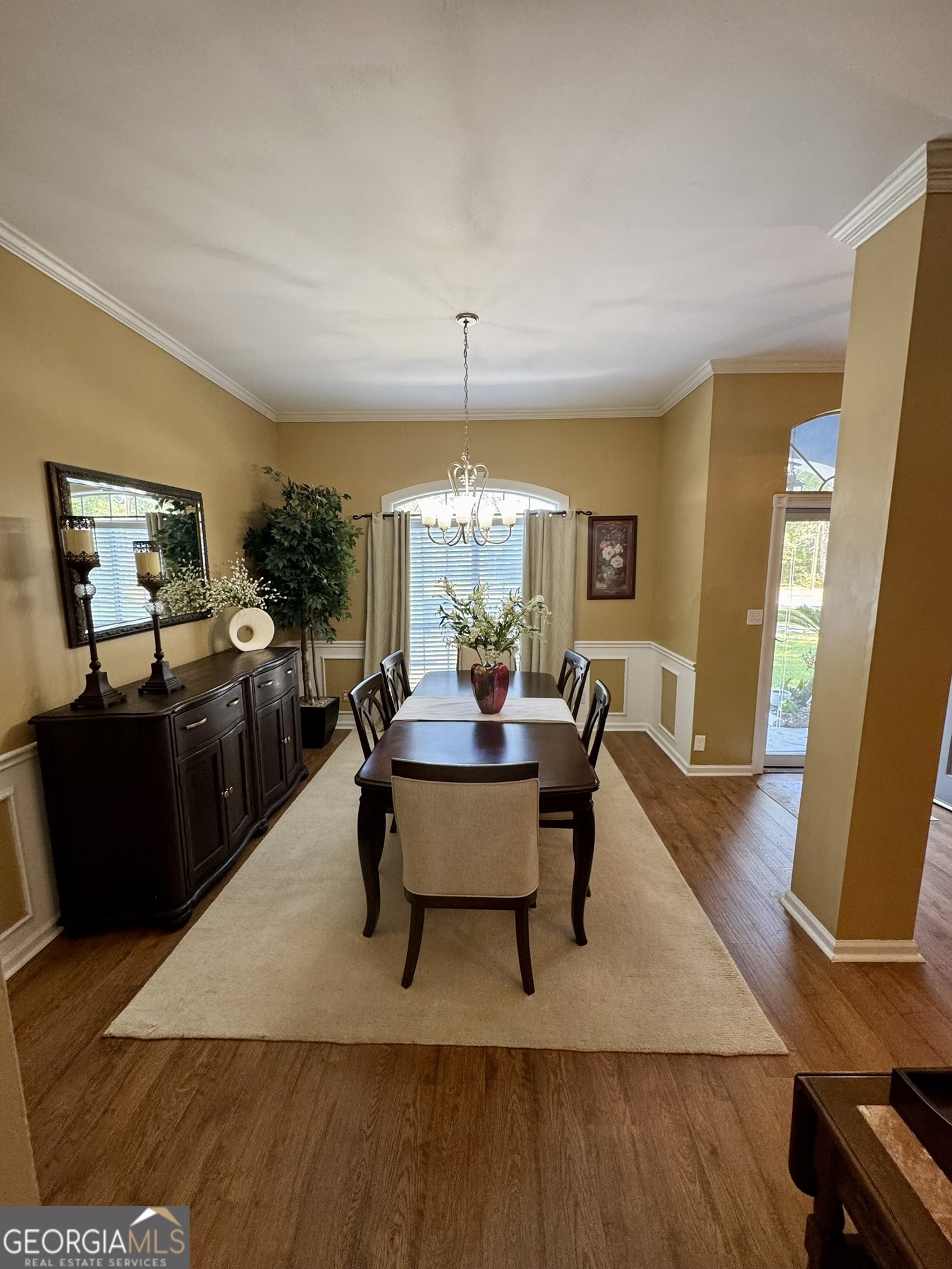4633 Rustic Ridge Road Valdosta, GA 31602 - Photo 8 of 46 a living room with furniture a window and wooden floor