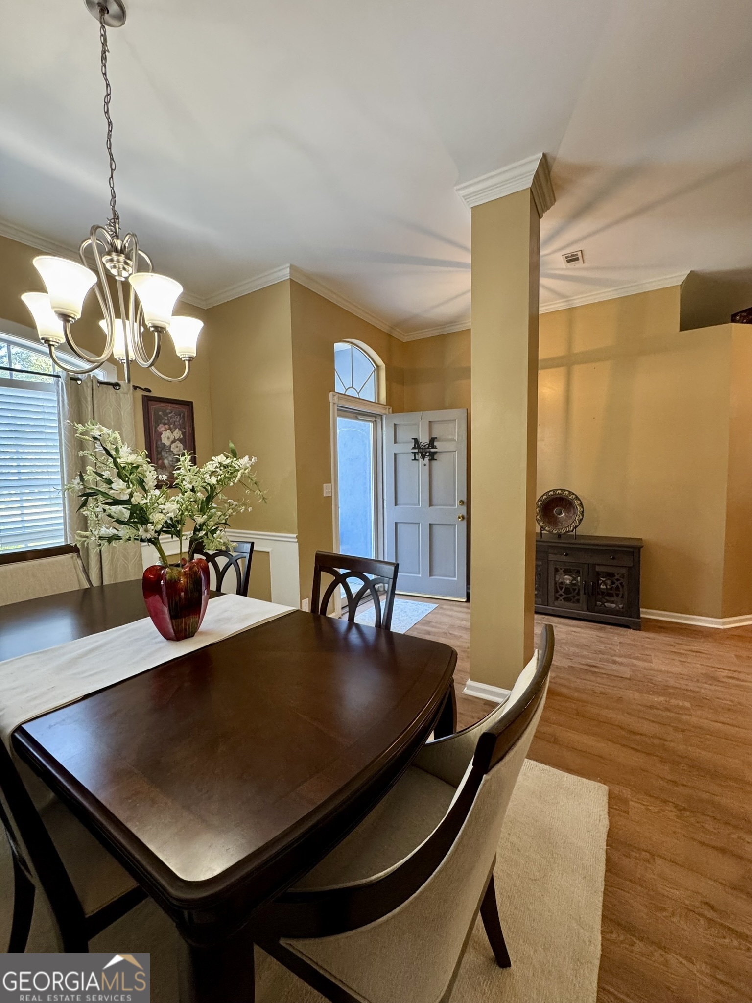 4633 Rustic Ridge Road Valdosta, GA 31602 - Photo 9 of 46 a dining room with furniture and wooden floor