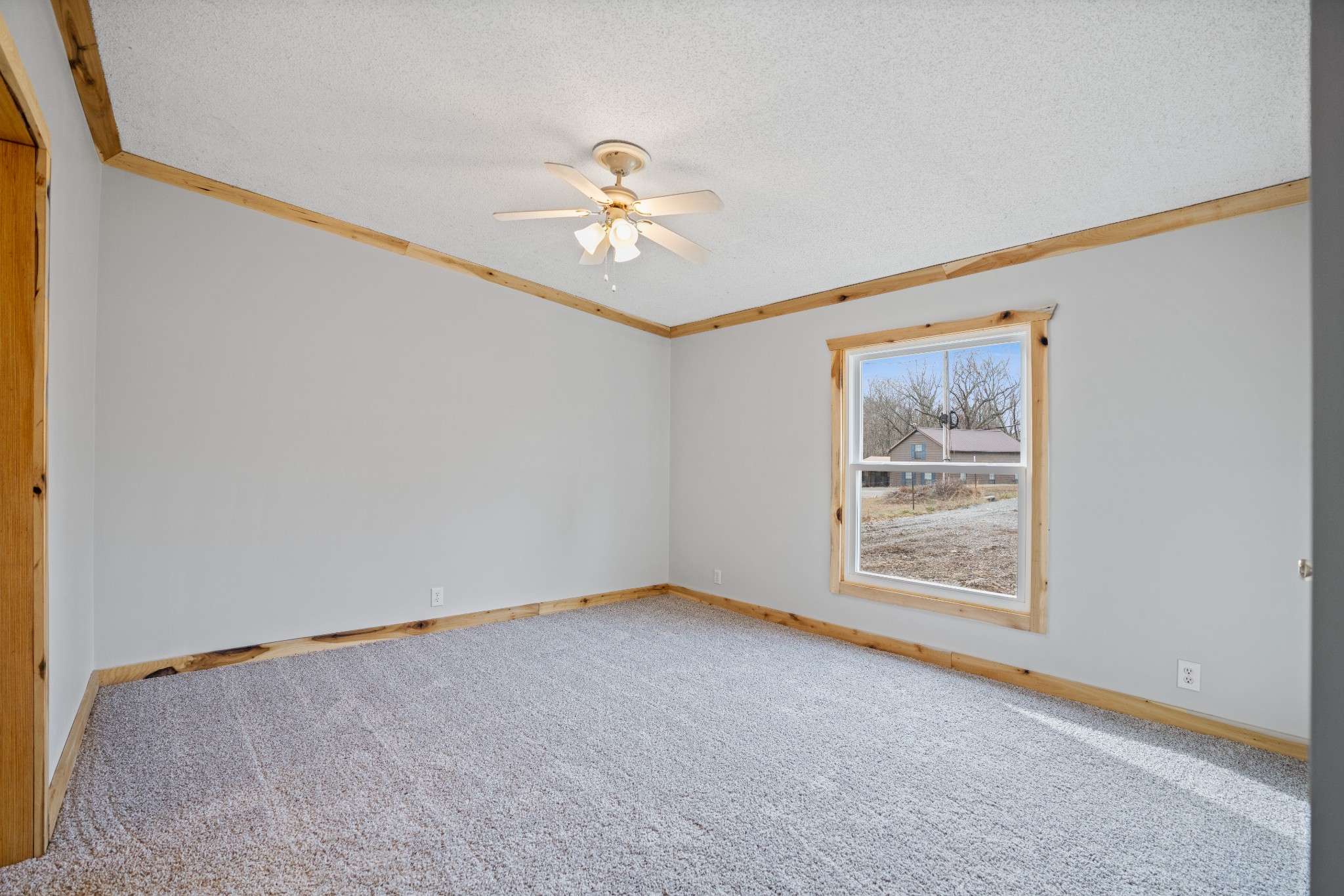 4227 Old Metal Road Palmyra, TN 37142 - Photo 11 of 16 a view of an empty room with a window