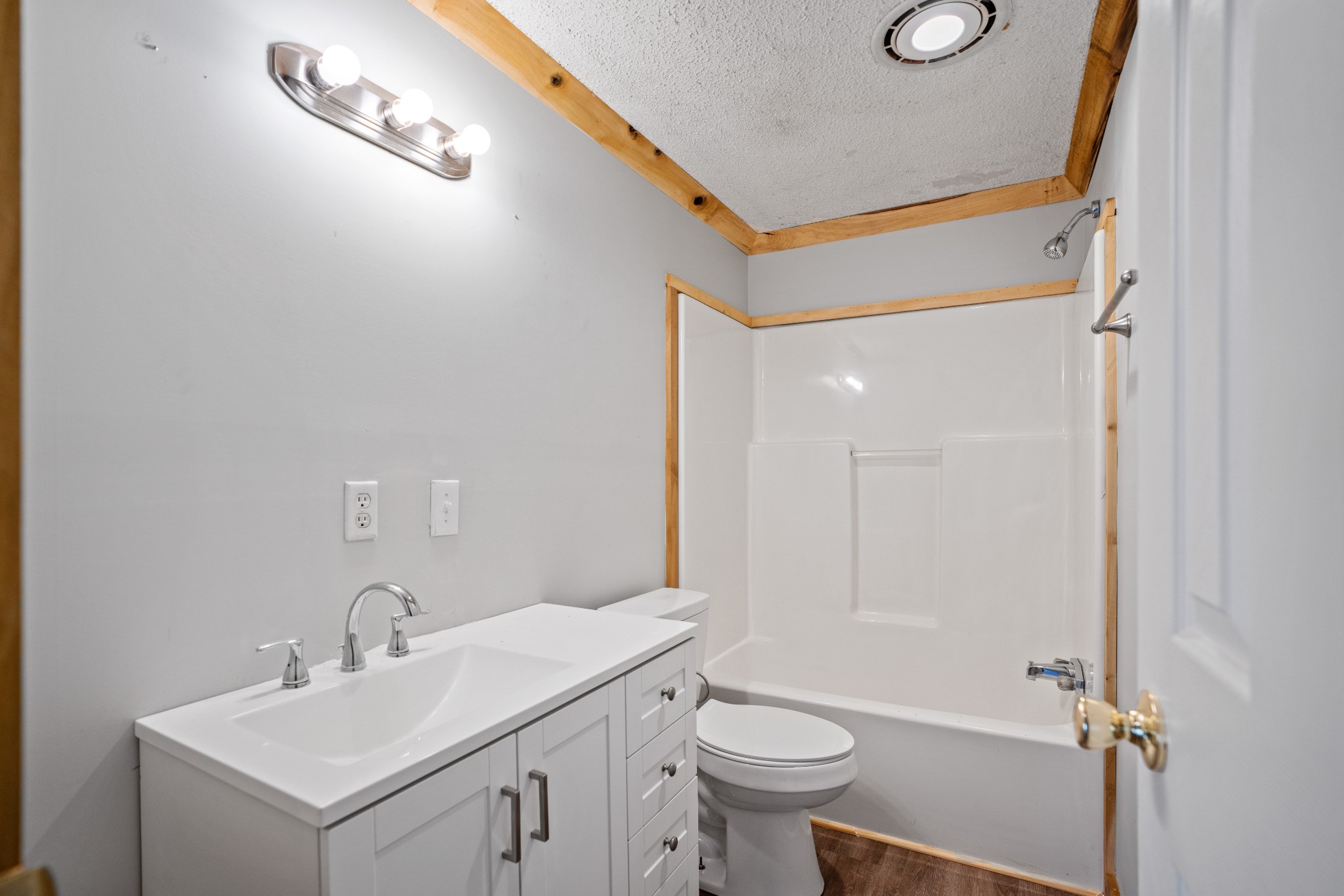 4227 Old Metal Road Palmyra, TN 37142 - Photo 13 of 16 a bathroom with a sink mirror vanity and toilet