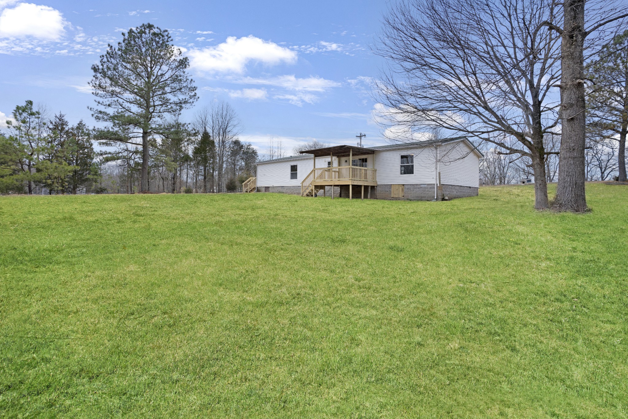 4227 Old Metal Road Palmyra, TN 37142 - Photo 14 of 16 a view of a yard in front of a house