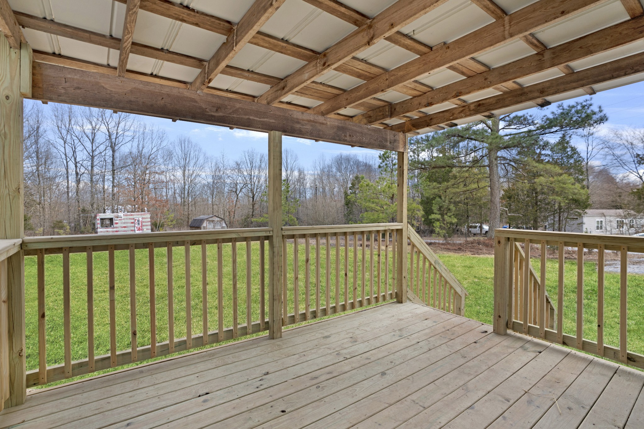4227 Old Metal Road Palmyra, TN 37142 - Photo 16 of 16 a view of balcony with wooden floor