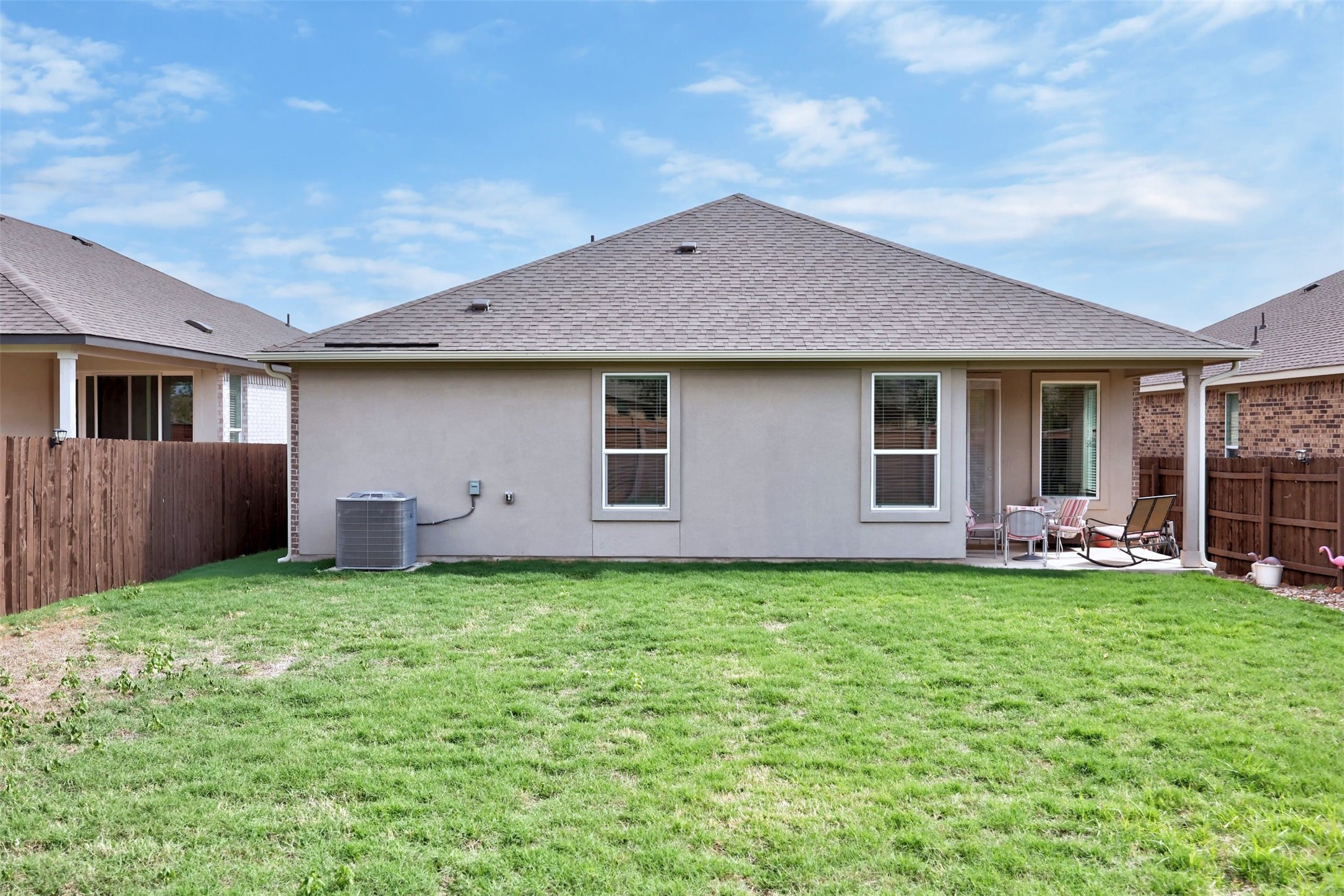 2041 Centerline Lane Georgetown, TX 78628 - Photo 28 of 31 a backyard of a house with table and chairs
