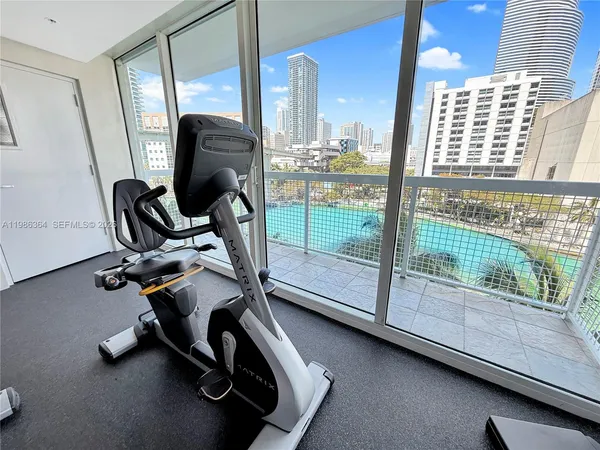a view of a room with gym equipment