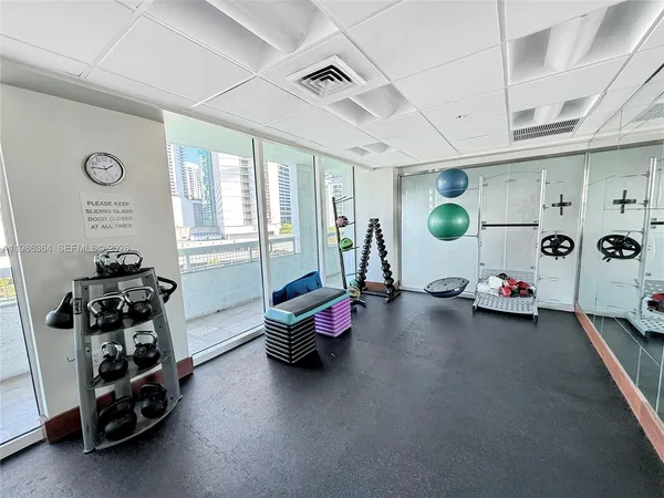 a view of a room with gym equipment