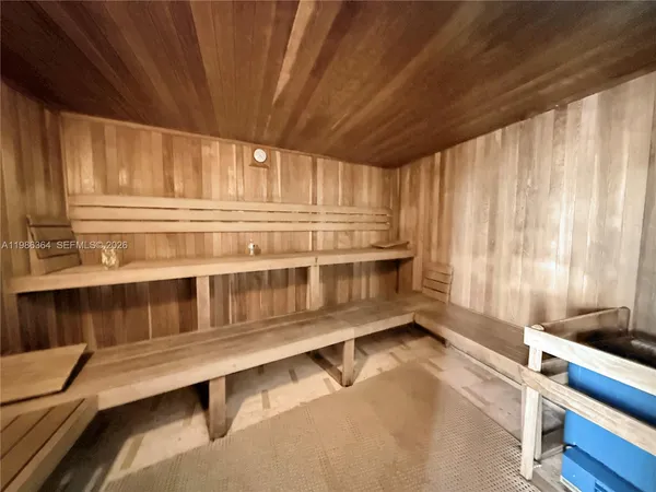 a view of a room with racks on the wall