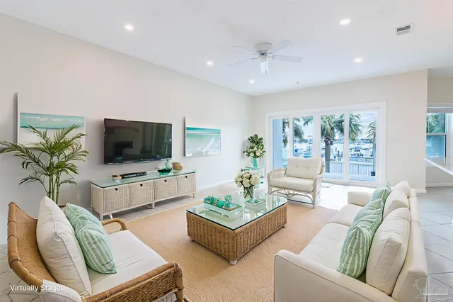 a bedroom with a bed and a potted plant