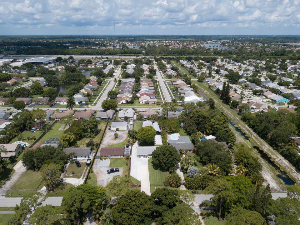 5547 3rd Road Lake Worth, FL 33467 - Photo 21 of 34 an aerial view of multiple house