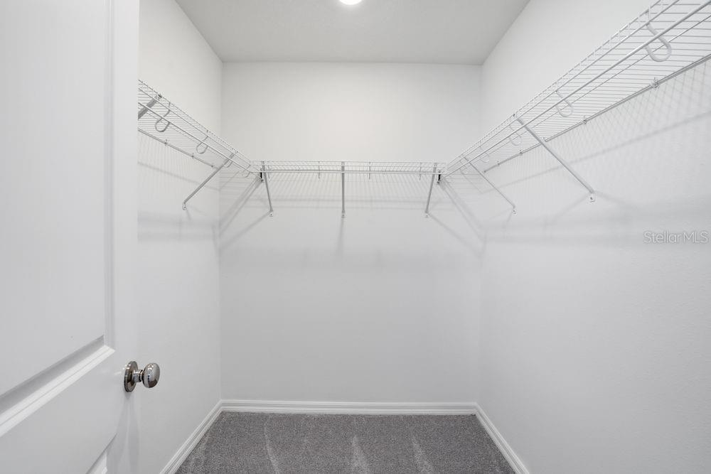 13243 Commons Avenue Parrish, FL 34219 - Photo 17 of 44 a view of small space with racks on the wall