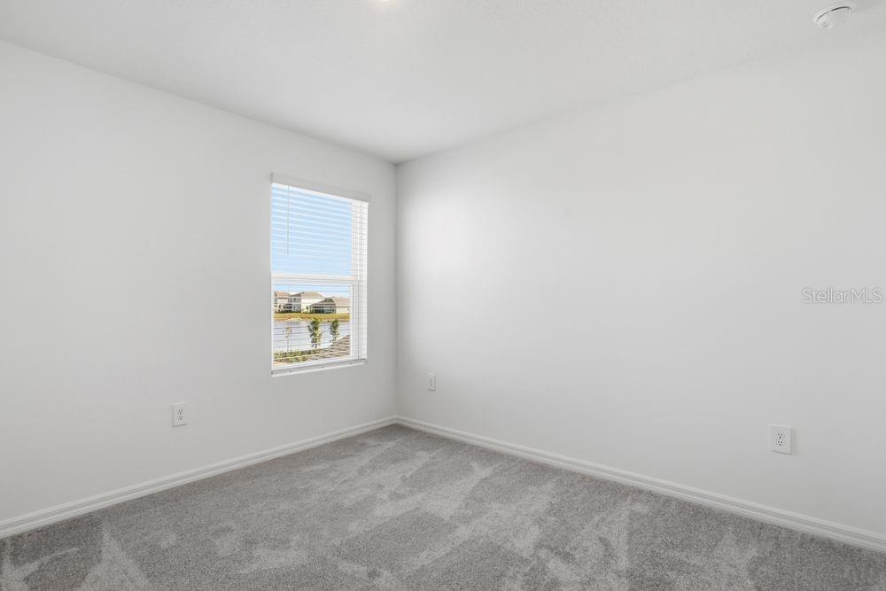 13243 Commons Avenue Parrish, FL 34219 - Photo 18 of 44 an empty room with a window