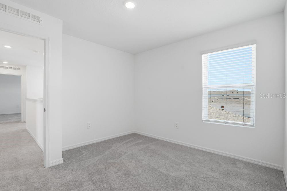 13243 Commons Avenue Parrish, FL 34219 - Photo 19 of 44 an empty room with a window