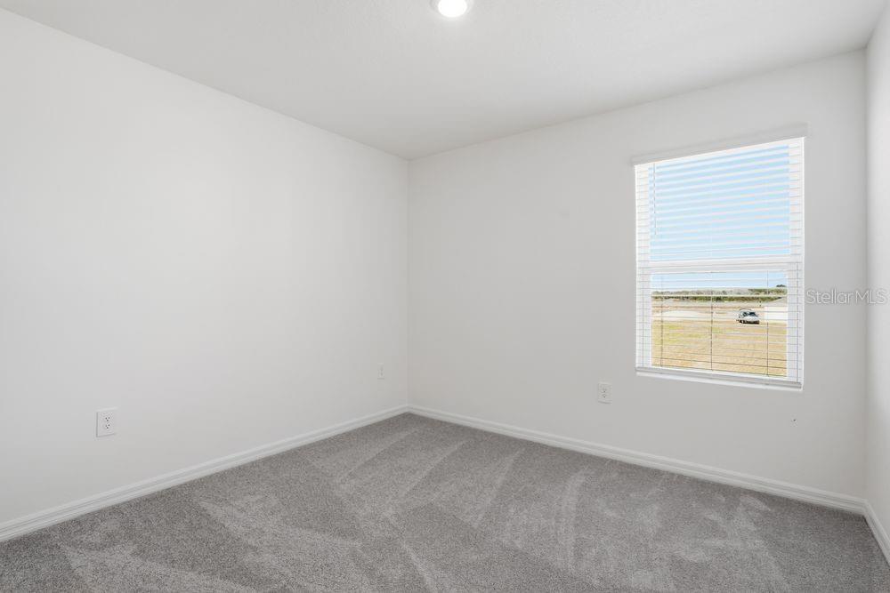 13243 Commons Avenue Parrish, FL 34219 - Photo 20 of 44 an empty room with a window