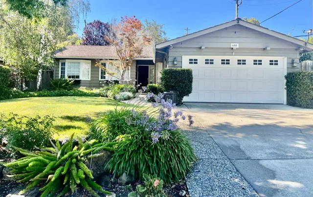 a view of a house with swimming pool