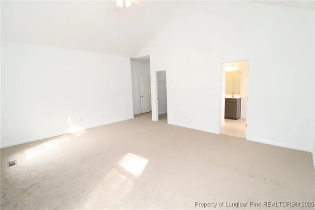 a bathroom with a sink vanity and mirror