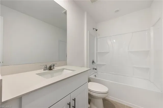 a bathroom with a sink toilet and a bathtub