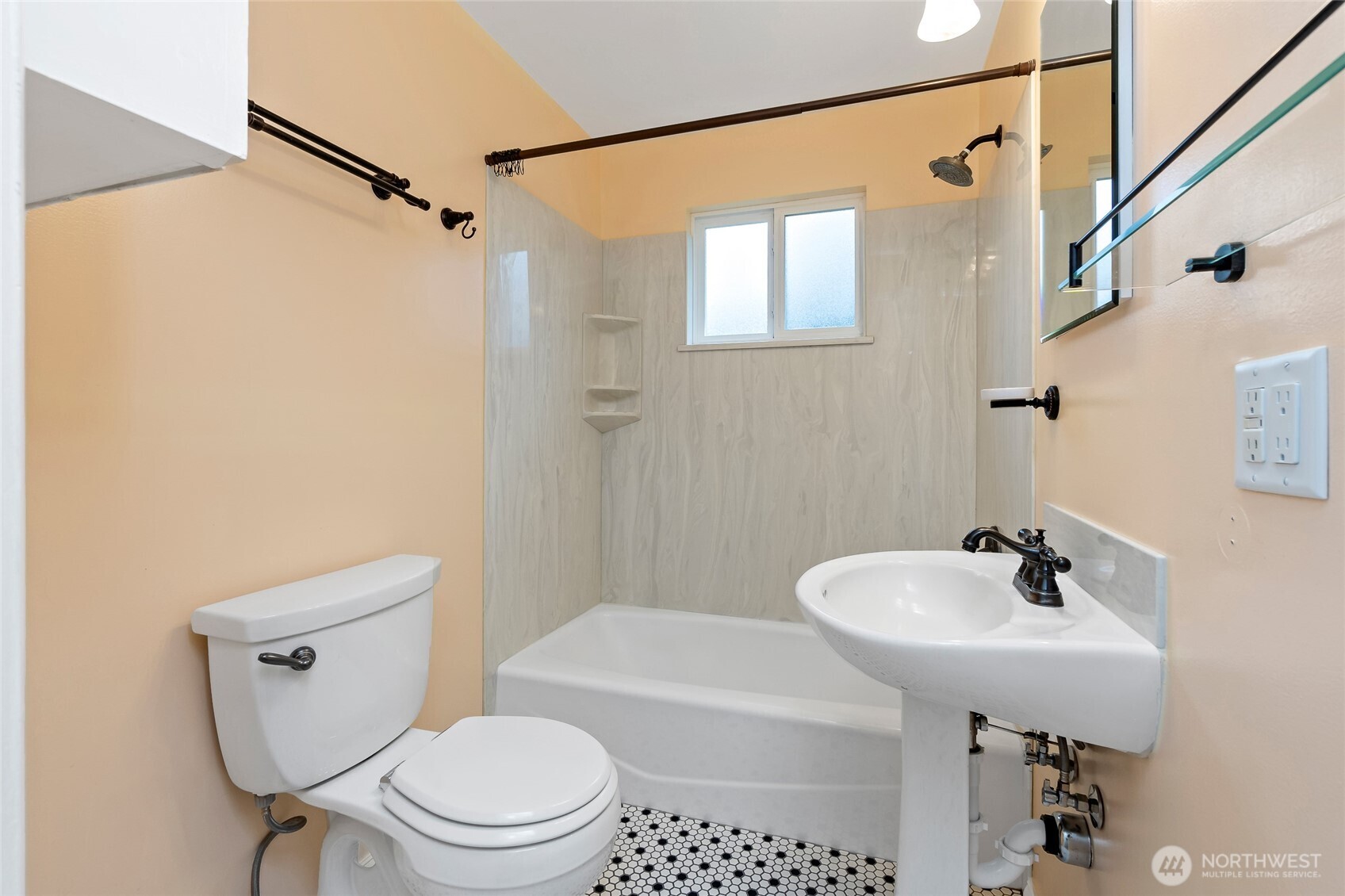 527 Ramsdell Street Fircrest, WA 98466 - Photo 15 of 40 a bathroom with a sink a toilet and shower