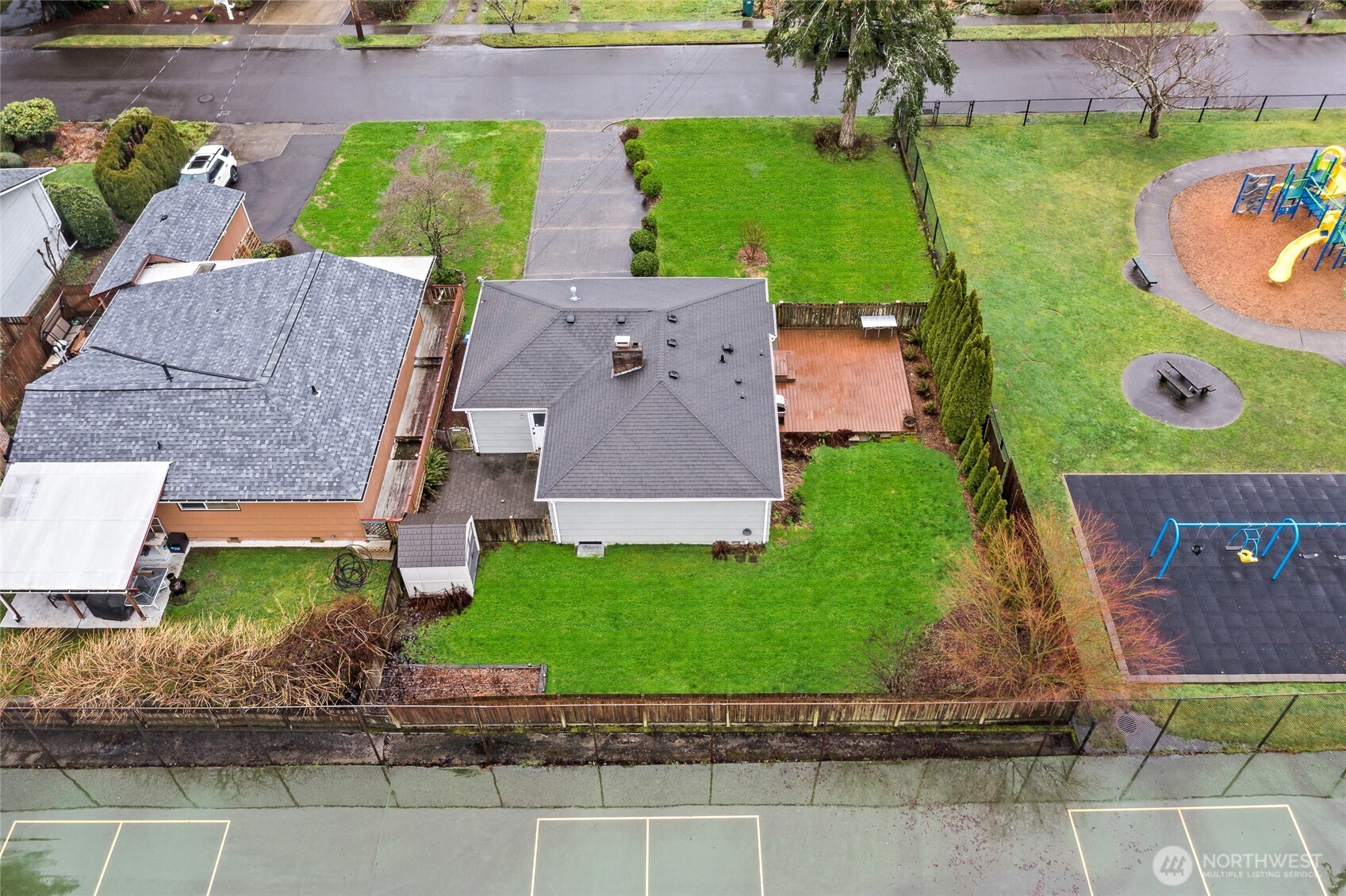 527 Ramsdell Street Fircrest, WA 98466 - Photo 24 of 40 an aerial view of a house with garden space and street view