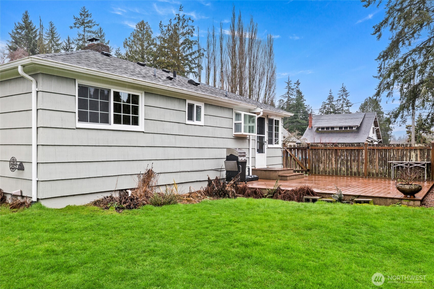 527 Ramsdell Street Fircrest, WA 98466 - Photo 25 of 40 a view of a house with a yard and sitting area