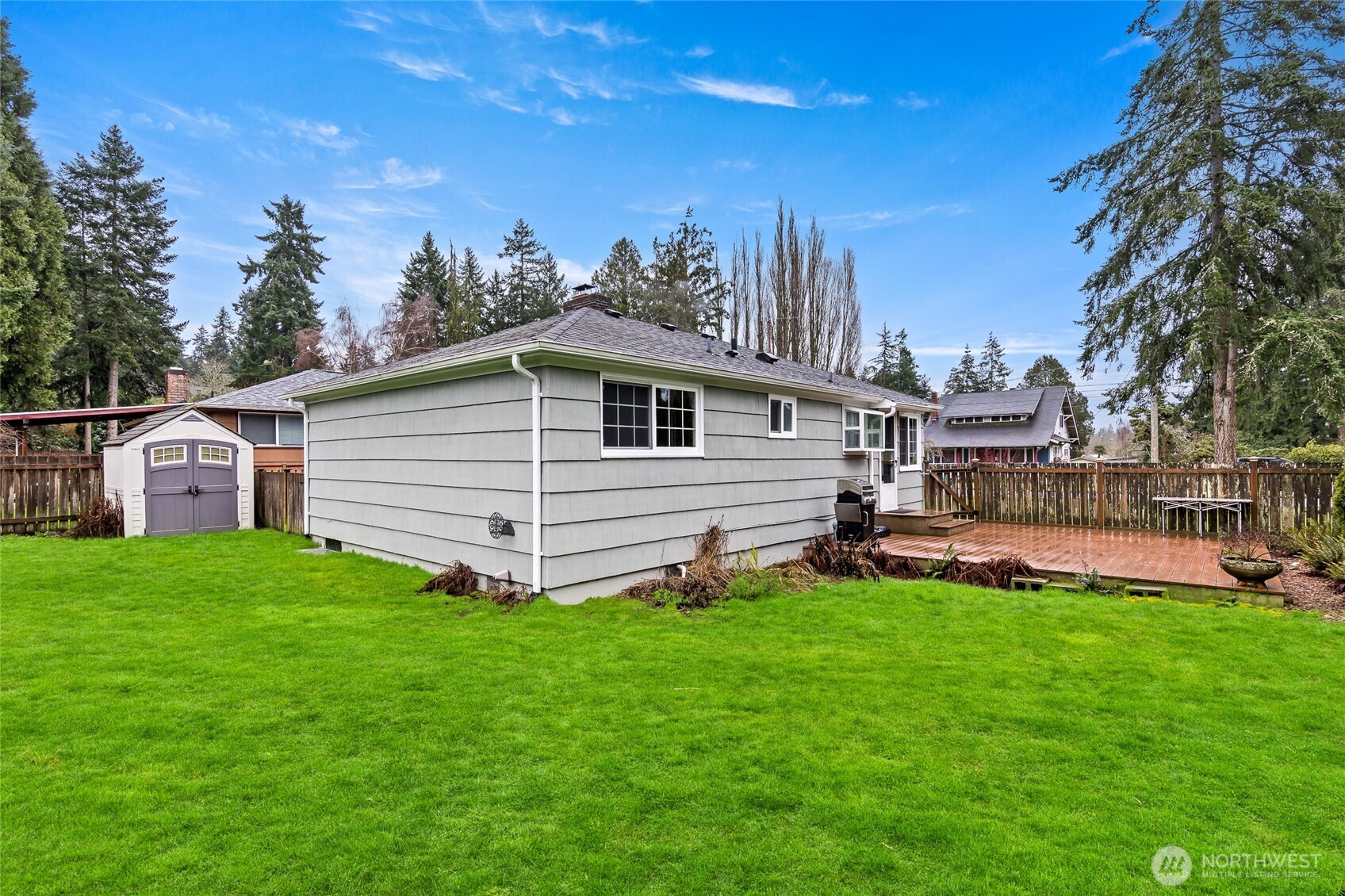 527 Ramsdell Street Fircrest, WA 98466 - Photo 29 of 40 a view of a house with a yard and sitting area