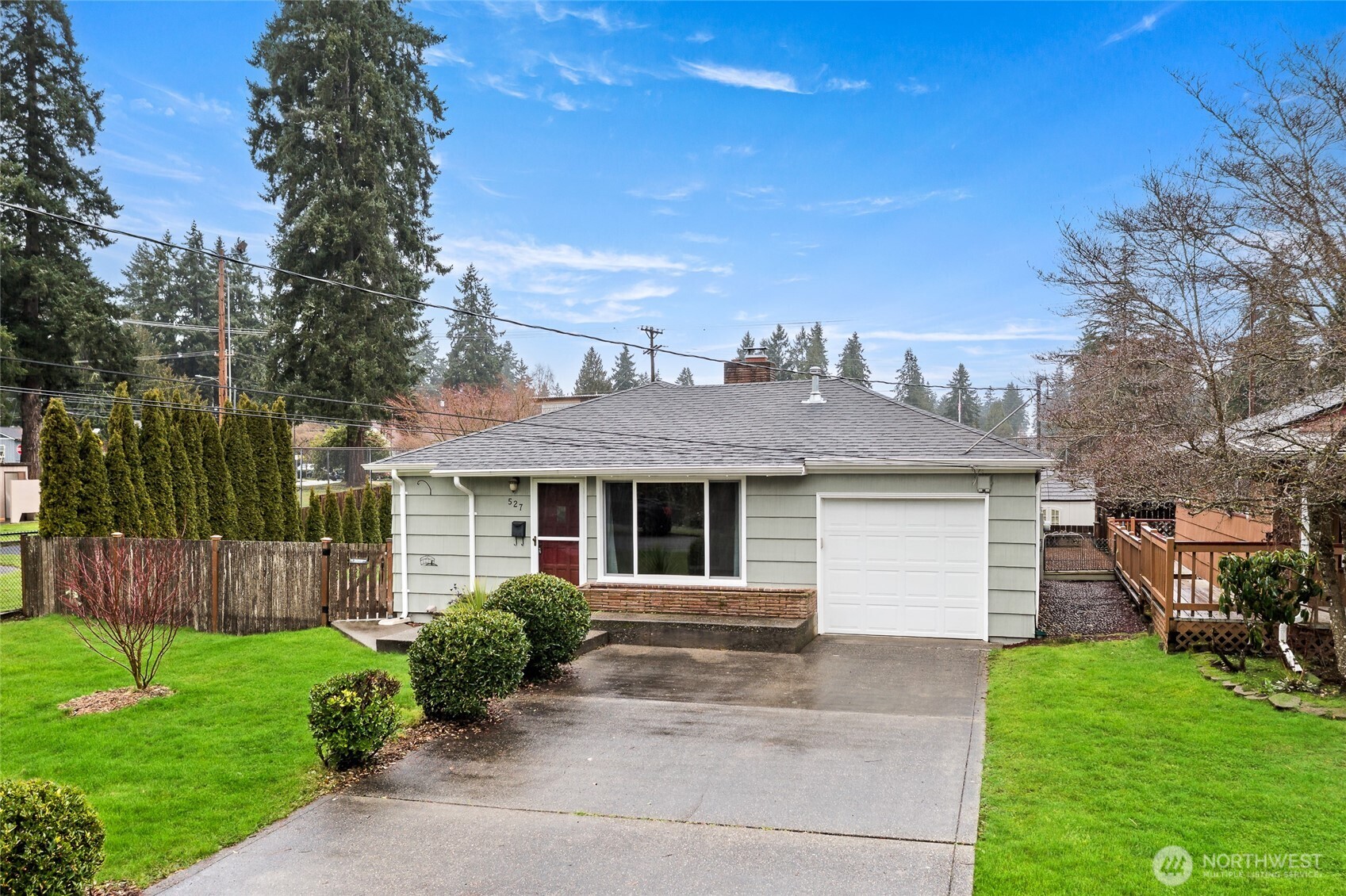 527 Ramsdell Street Fircrest, WA 98466 - Photo 40 of 40 a front view of a house with a yard and potted plants