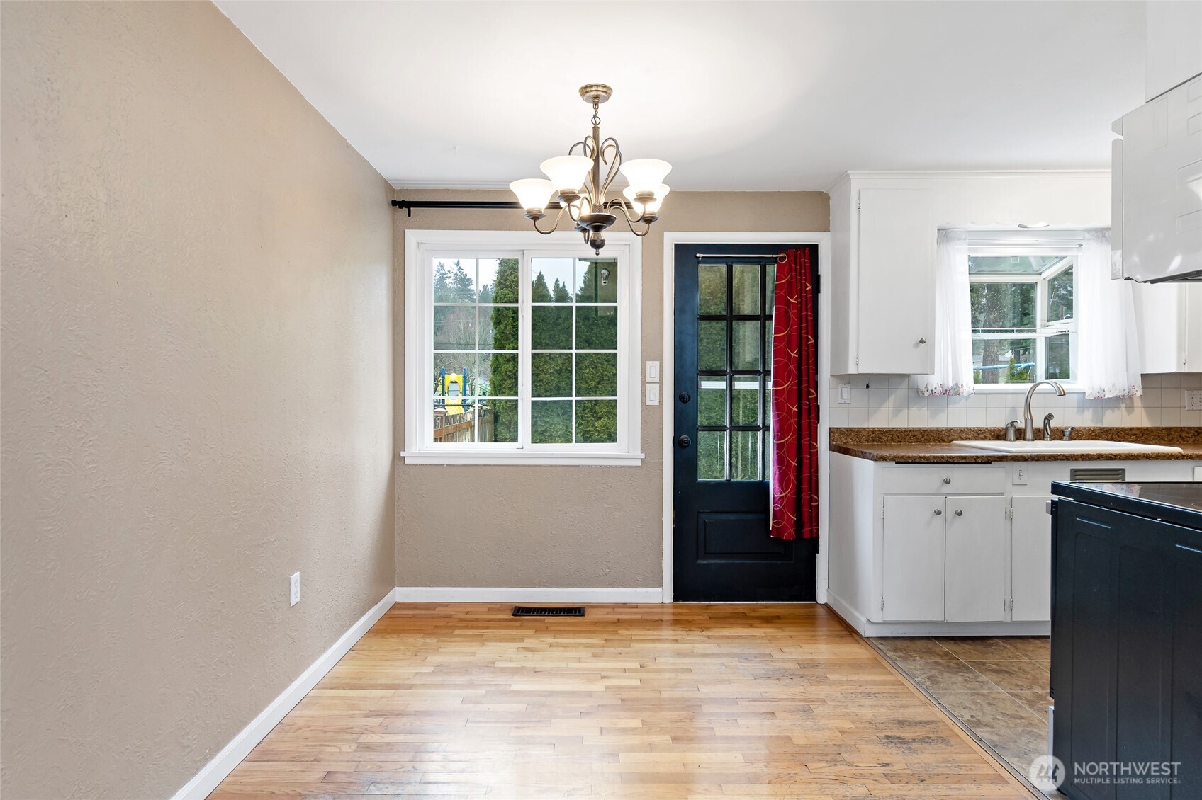 527 Ramsdell Street Fircrest, WA 98466 - Photo 9 of 40 a view of an empty room with a window