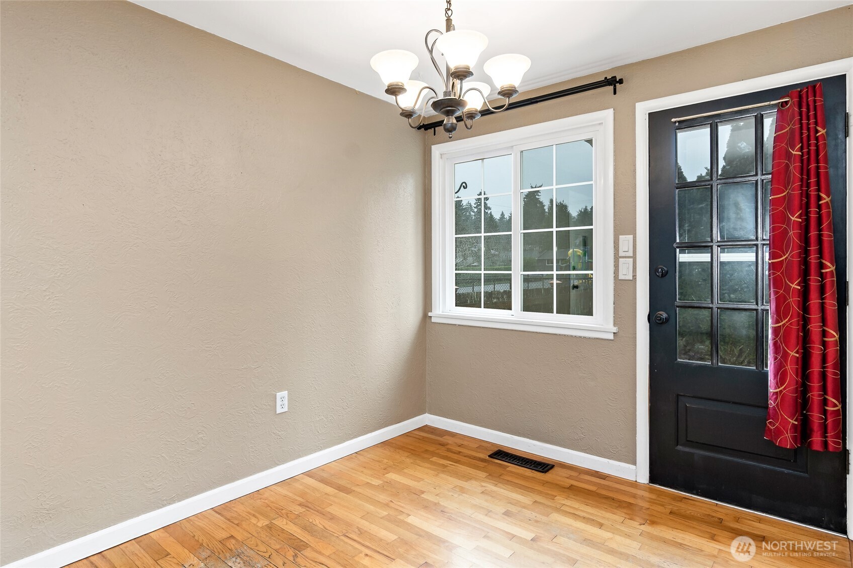 527 Ramsdell Street Fircrest, WA 98466 - Photo 10 of 40 a view of an empty room with a window