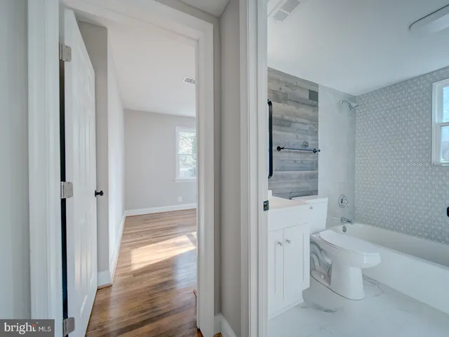a bathroom with a sink and toilet