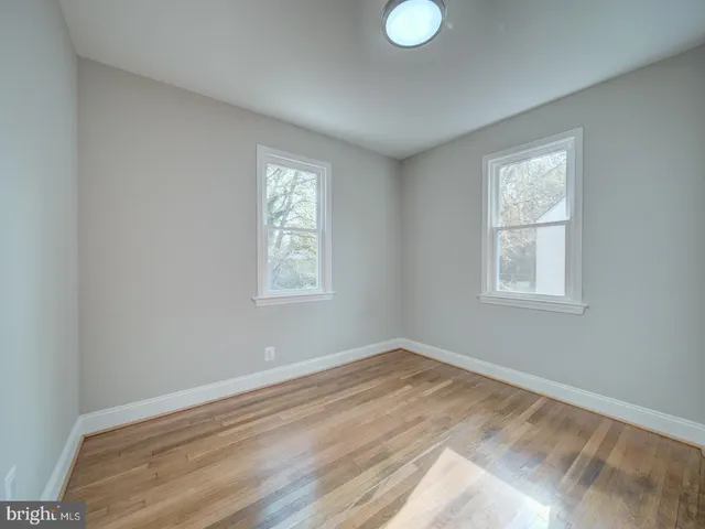 a view of a room that has a window in it