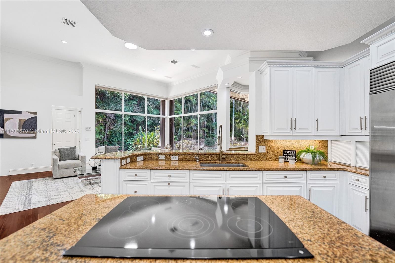169 Dockside Circle Weston, FL 33327 - Photo 20 of 61 a living room with large window and furniture