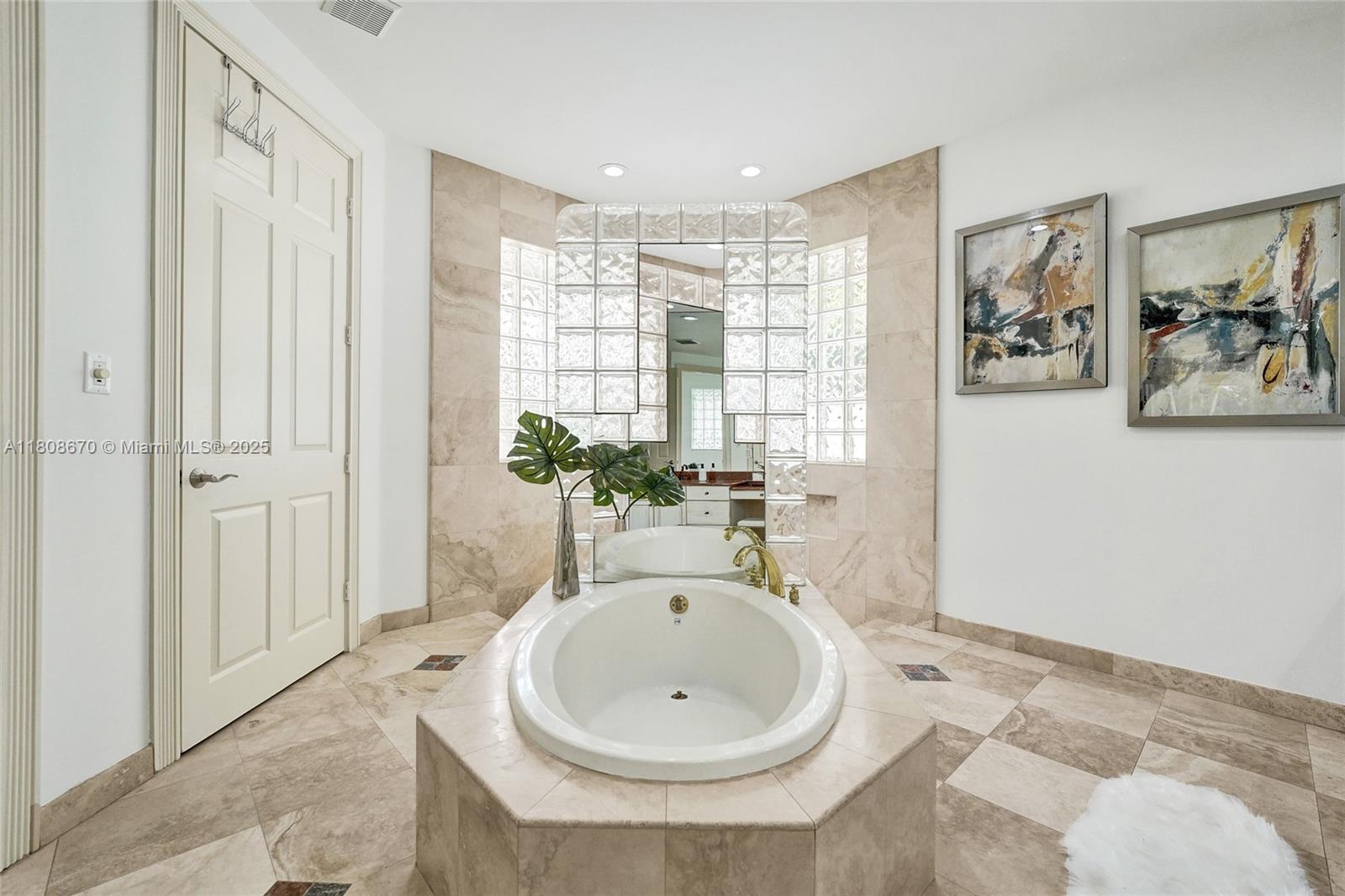 169 Dockside Circle Weston, FL 33327 - Photo 28 of 61 a bathroom with a sink and a bathtub