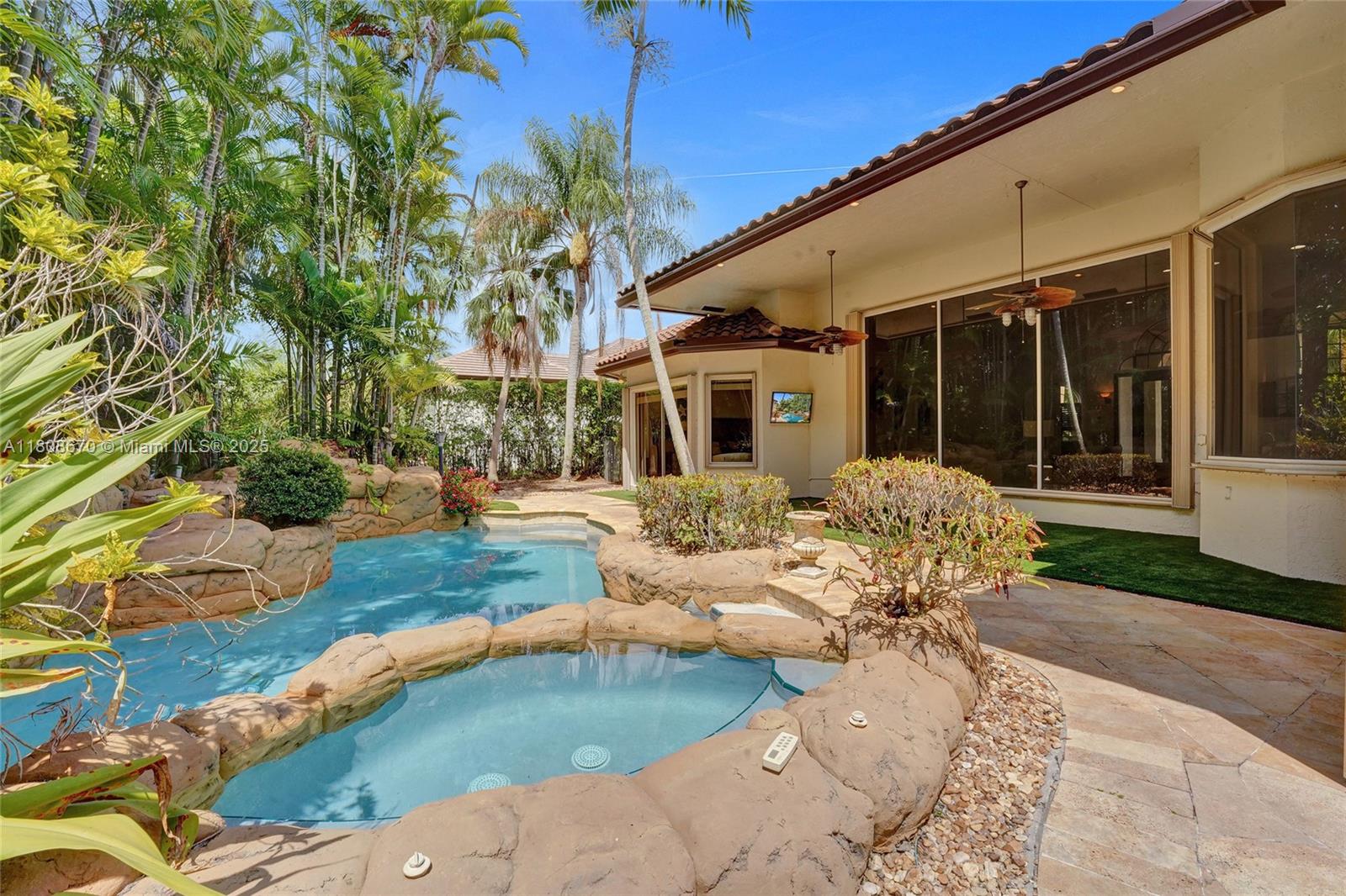 169 Dockside Circle Weston, FL 33327 - Photo 52 of 61 front view of a house with a patio