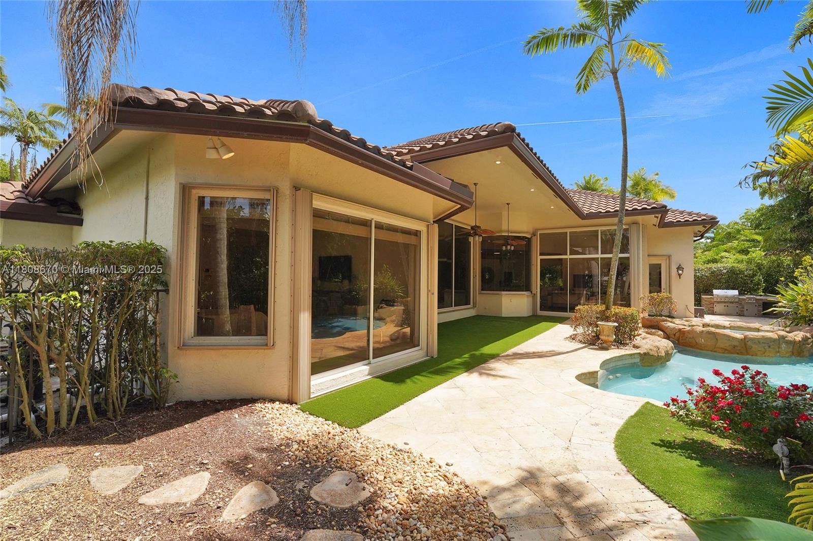 169 Dockside Circle Weston, FL 33327 - Photo 56 of 61 a front view of a house with garden