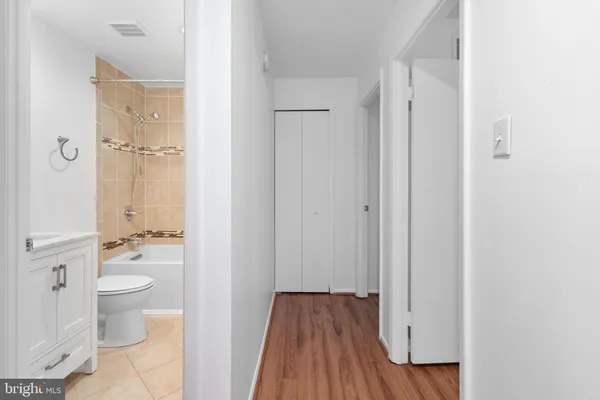 a view of bathroom with a toilet a sink and a shower