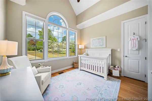 a bedroom with a bed and closet