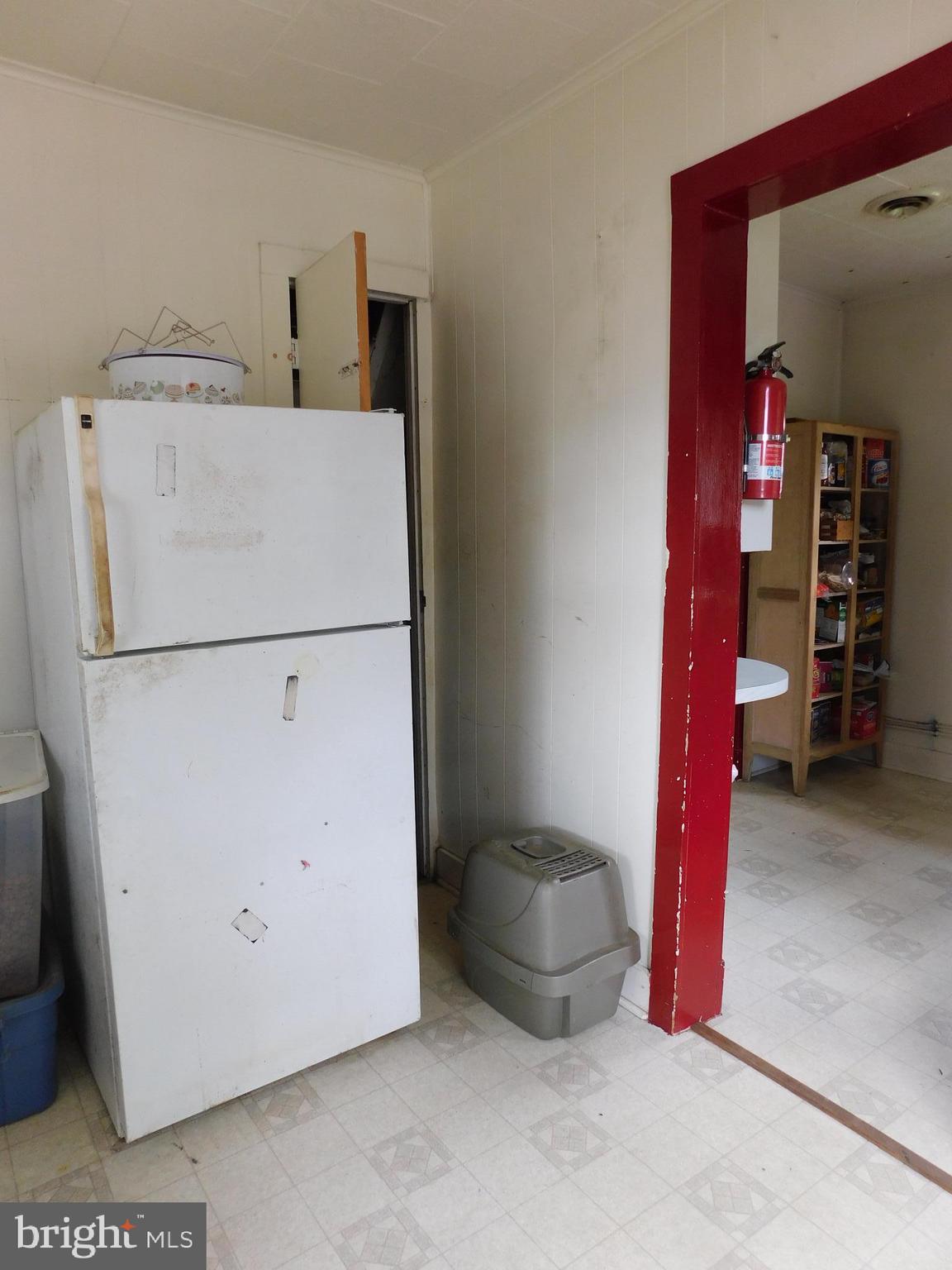 1619 Dooley Road Whiteford, MD 21160 - Photo 14 of 14 Mudroom Refrigerator and View to Kitchen