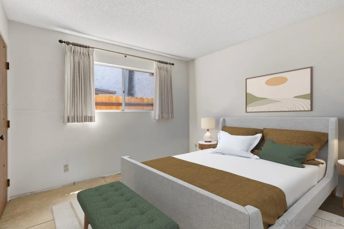 1740 Kirk Place Carlsbad, CA 92008 - Photo 16 of 22 a bedroom with a bed and window