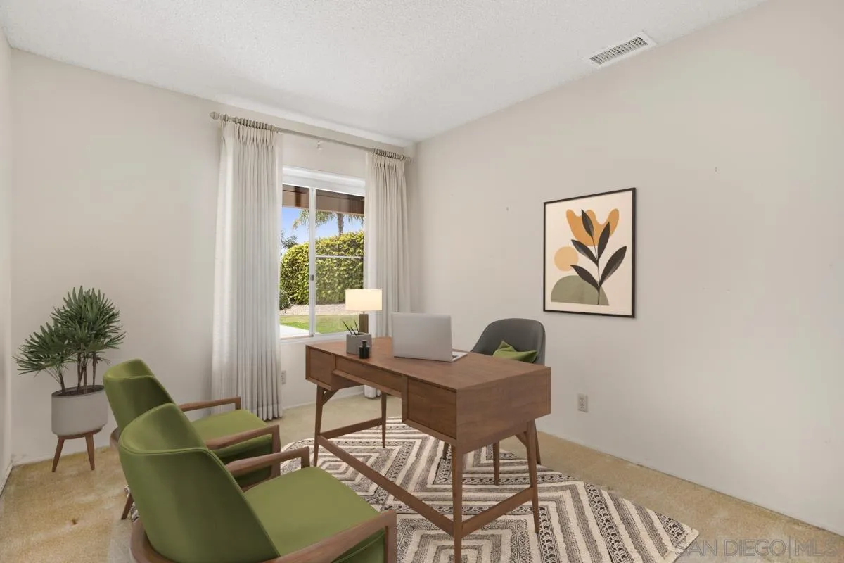 1740 Kirk Place Carlsbad, CA 92008 - Photo 4 of 22 a view of a workspace with furniture and a window