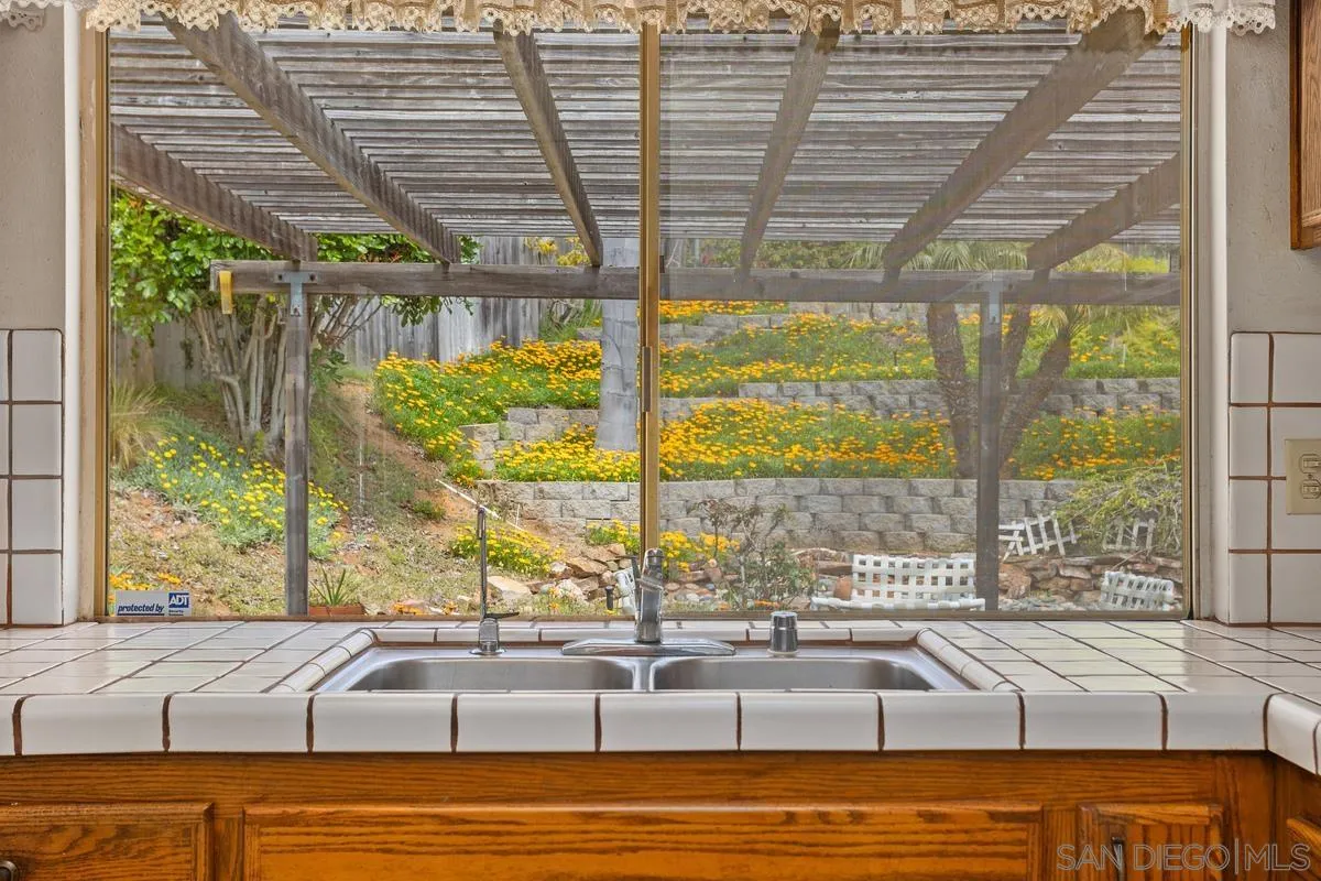 1740 Kirk Place Carlsbad, CA 92008 - Photo 9 of 22 a view of swimming pool with outdoor seating and yard in the back
