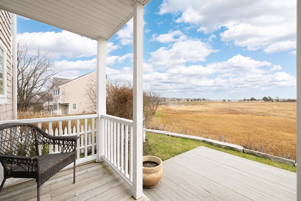 7 Cutter Lane, Unit 7 Quincy, MA 02171 - Photo 13 of 28 a view of an ocean from a balcony