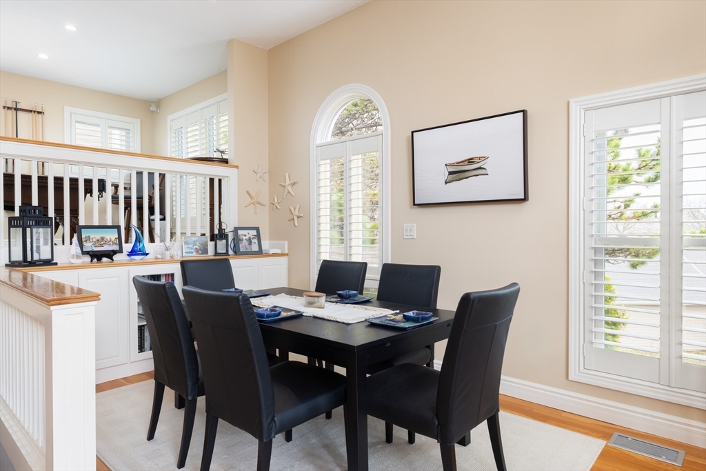 7 Cutter Lane, Unit 7 Quincy, MA 02171 - Photo 2 of 28 a view of a dining room with furniture window and wooden floor