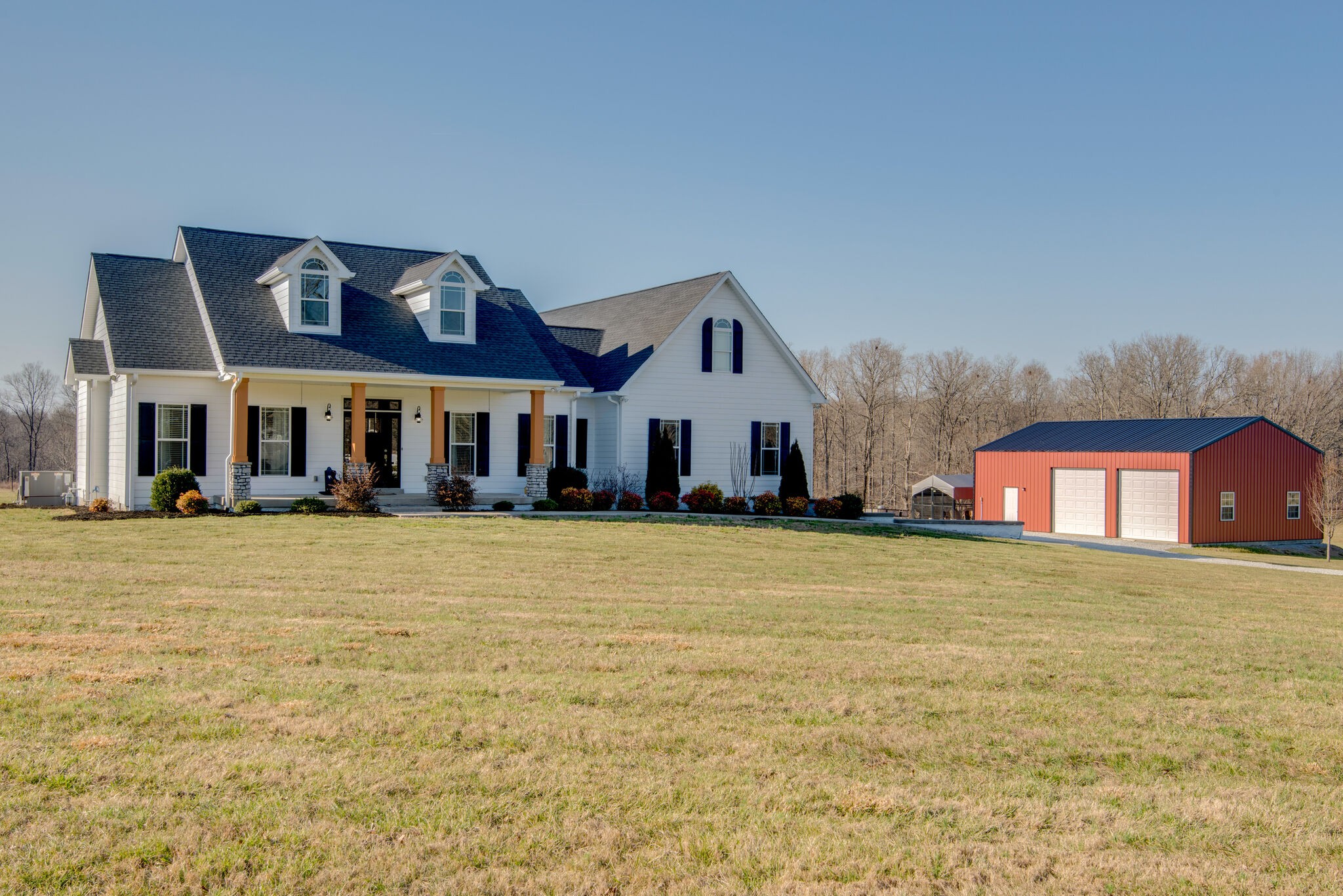 2822 Lock Hollow Road Dickson, TN 37055 - Photo 1 of 45 a front view of a house with a yard
