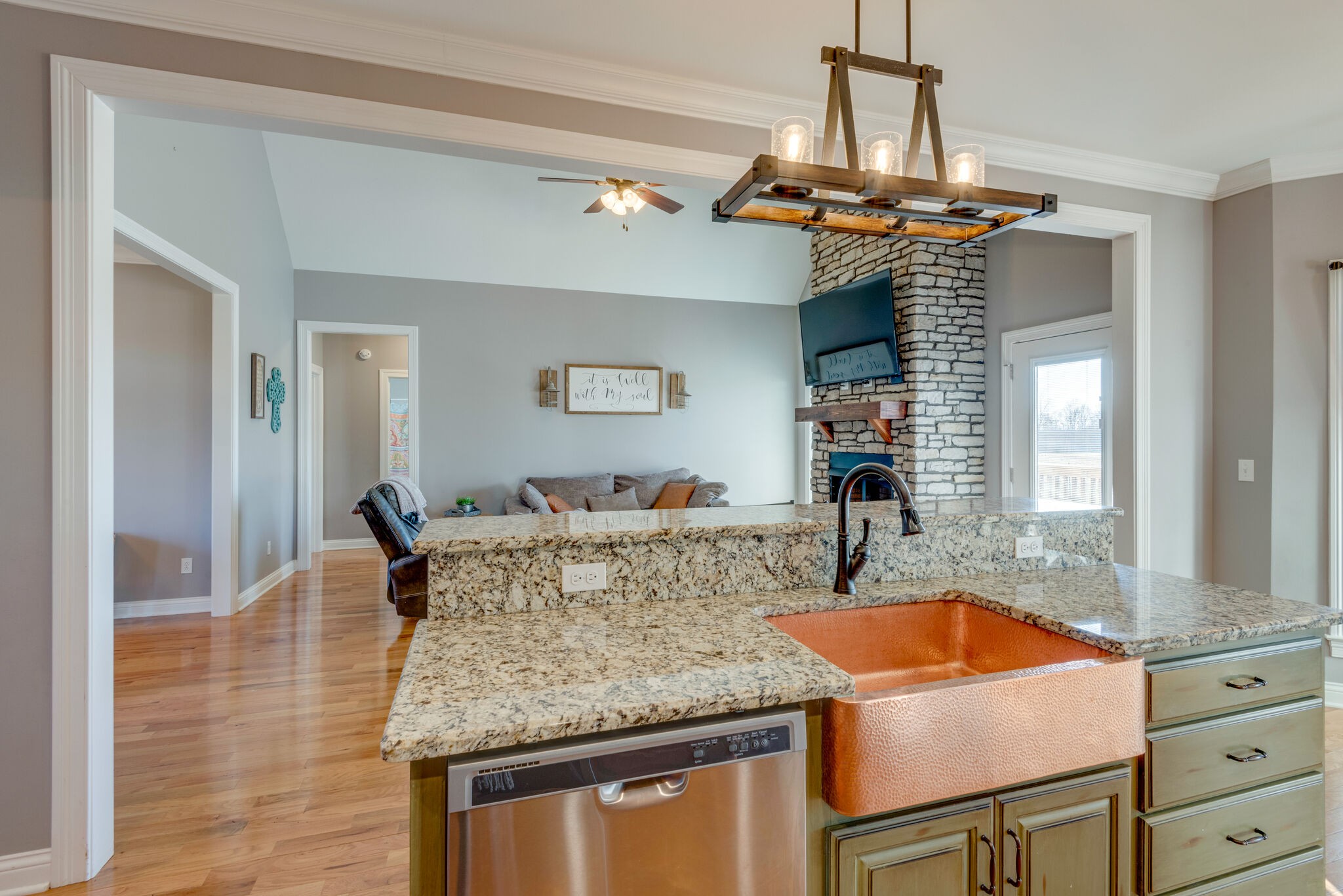 2822 Lock Hollow Road Dickson, TN 37055 - Photo 19 of 45 a kitchen with a granite countertop sink and refrigerator
