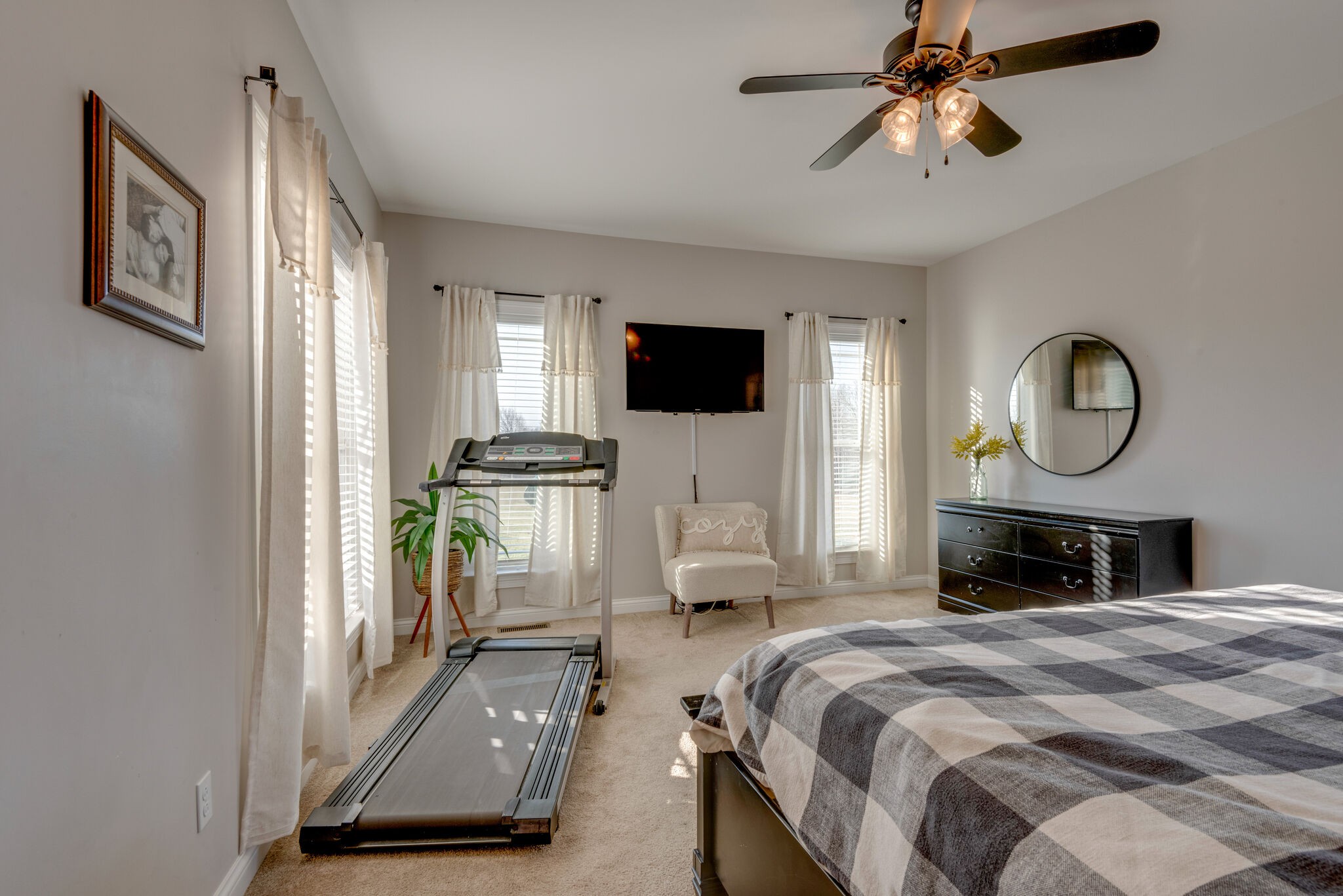 2822 Lock Hollow Road Dickson, TN 37055 - Photo 20 of 45 a bedroom with a bed a mirror and furniture