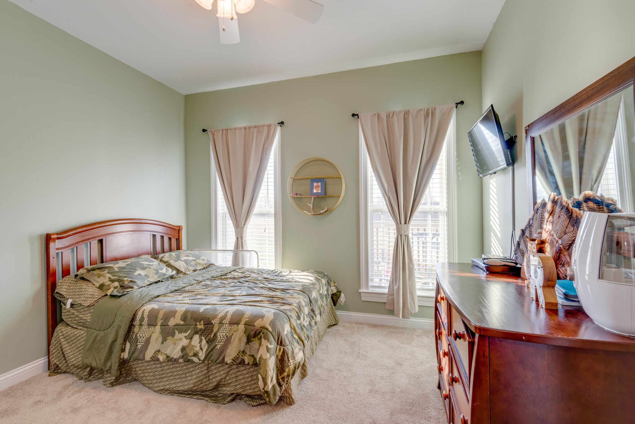 2822 Lock Hollow Road Dickson, TN 37055 - Photo 27 of 45 a bedroom with a bed and a large window