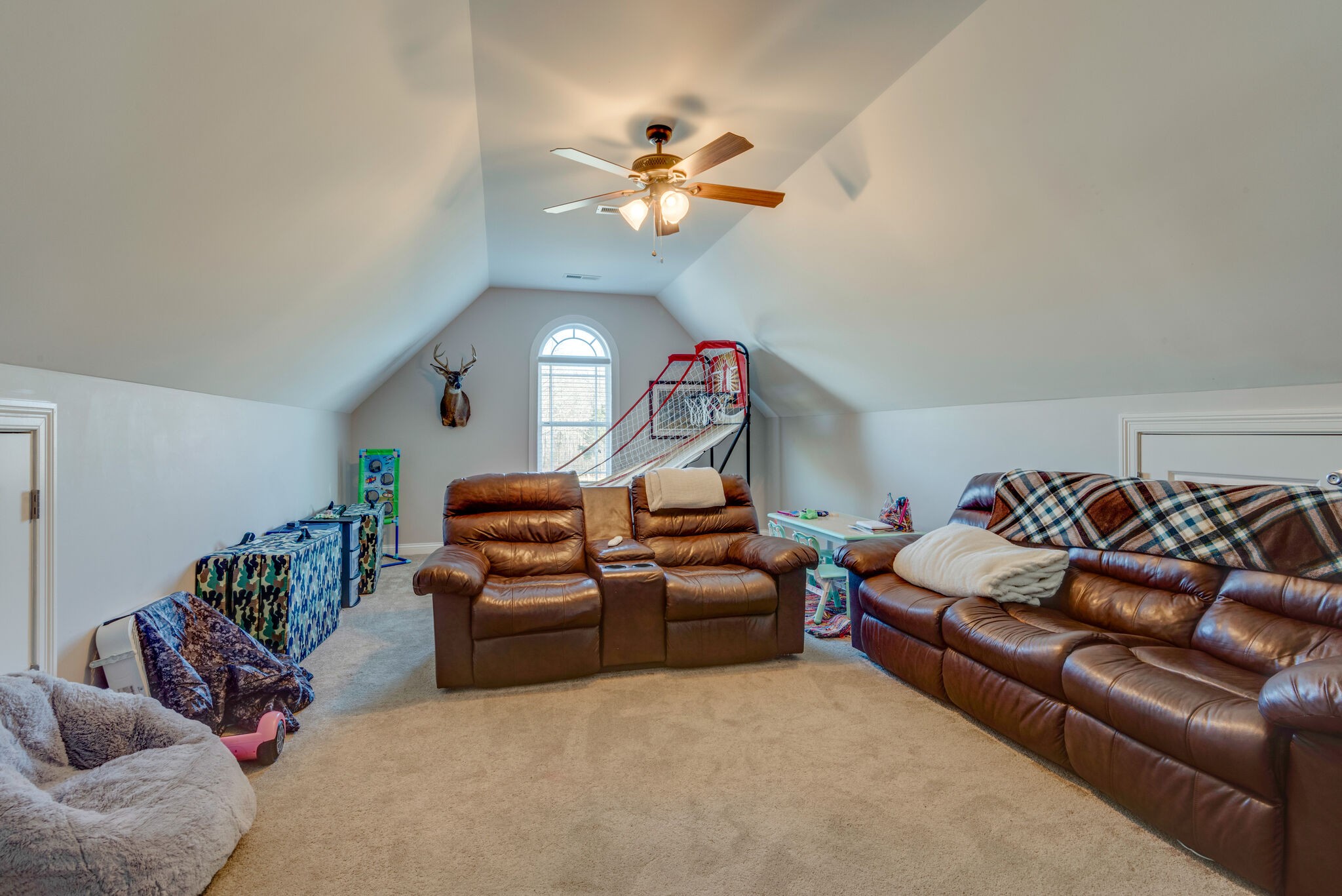 2822 Lock Hollow Road Dickson, TN 37055 - Photo 31 of 45 a living room with furniture a chandelier and a window