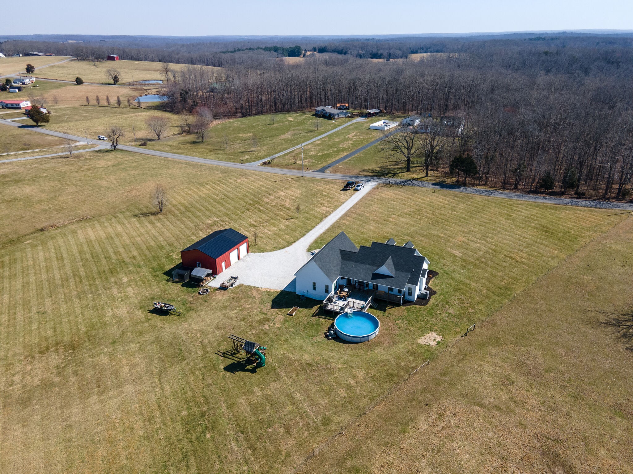 2822 Lock Hollow Road Dickson, TN 37055 - Photo 41 of 45 a view of a backyard with a table and chairs