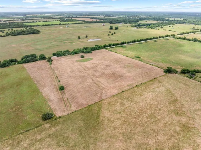 an aerial view of beach and ocean view